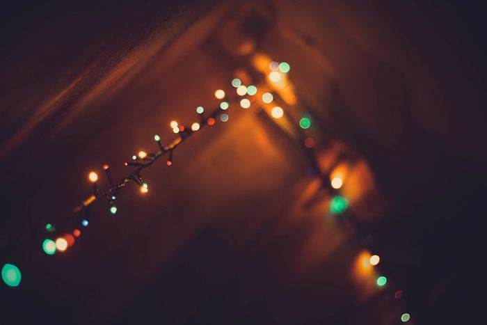 Warm string lights glowing in the dark